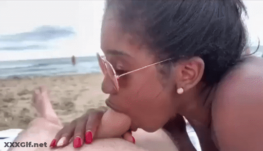 Amateur Ebony Blowjob On Nudist Beach With Girlfriend GIF