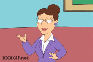 Babes In Glasses: A Mature Brunette's Sultry Gaze GIF