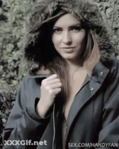 Babes With Big Tits: Brunette Hottie In A Coat GIF