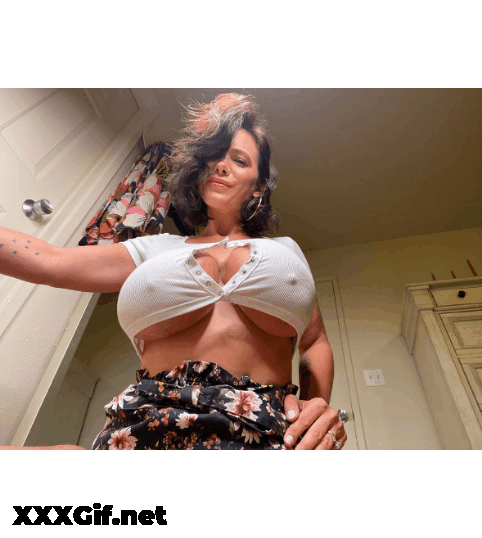 Big Boobs Brunette Babe Shows Off Her Huge Tits GIF