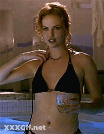 Bikini Babe In Pool: Topless Fun In The Sun GIF