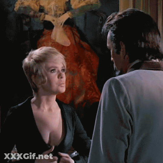 Joey Heatherton's Vintage Striptease: Short Hair, Long Legs, And Sultry Looks GIF