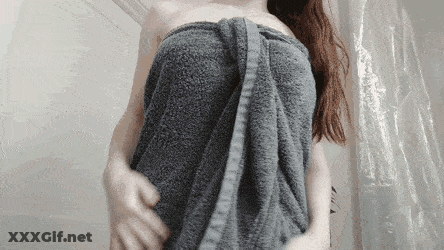 Redhead With Big Tits Shows Off Her Towel GIF