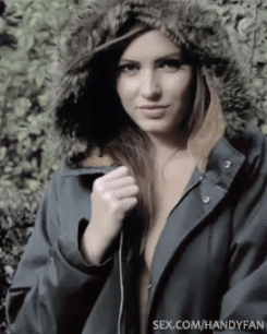 Babes With Big Tits: Brunette Hottie In A Coat GIF