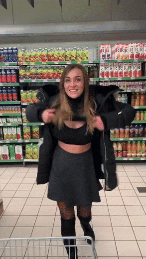 Josephine Jackson Flashes Busty Bikini In Grocery Store Aisle GIF