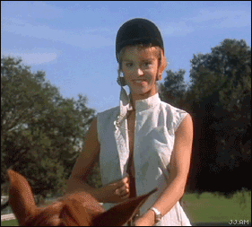 Riding A Horse With Big Tits In A Public Place GIF