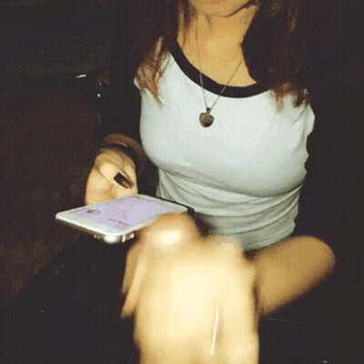 Amateur Girlfriend Gives Handjob While Distracted GIF