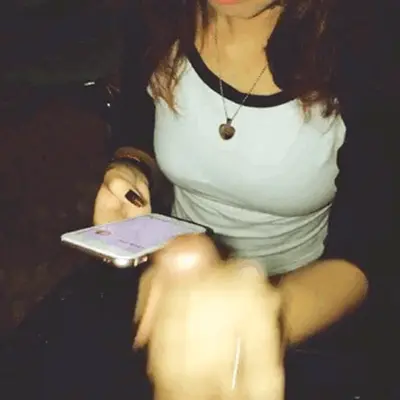 Amateur Girlfriend Gives Handjob While Distracted GIF