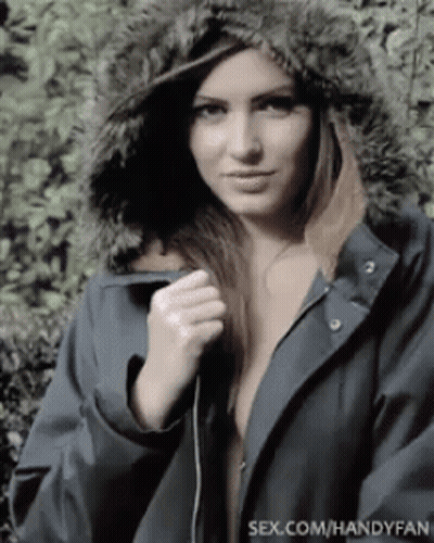 Babes With Big Tits: Brunette Hottie In A Coat GIF