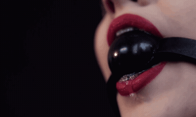 BDSM Drooling Gag: A Sensual Experience With Toys GIF