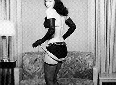 Bettie Page's Vintage Tease: A Sultry, Sensual Experience GIF
