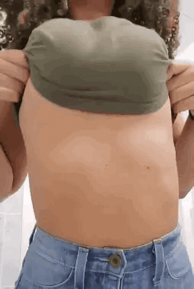 Big Tits Titty Drop: A Sizzling Hot Babe Exposes Her Juicy Goodies GIF