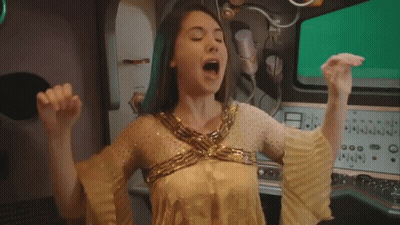 Busty Babe In Gold Dress Gets Nasty GIF