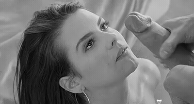 Cumshot On The Lips Of A Sexy Brunette GIF