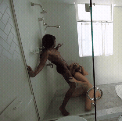 Interracial Lesbian Sex In The Shower: Two Women Get Naked And Fuck Each Other GIF