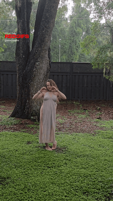 Just Playing Out In The Rain Together GIF
