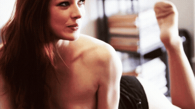 Redhead Stoya Gets Naked And Shows Off Her Tits GIF