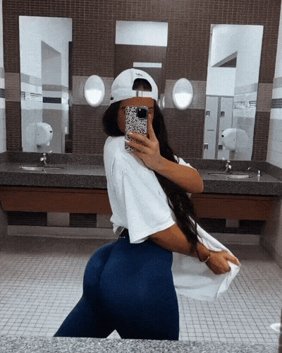 Squat & Snap: Gym Babe's Ass In Blue Leggings GIF