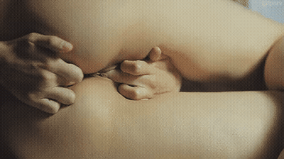 The Girl Puts Her Fingers In Her Pussy And Ass GIF